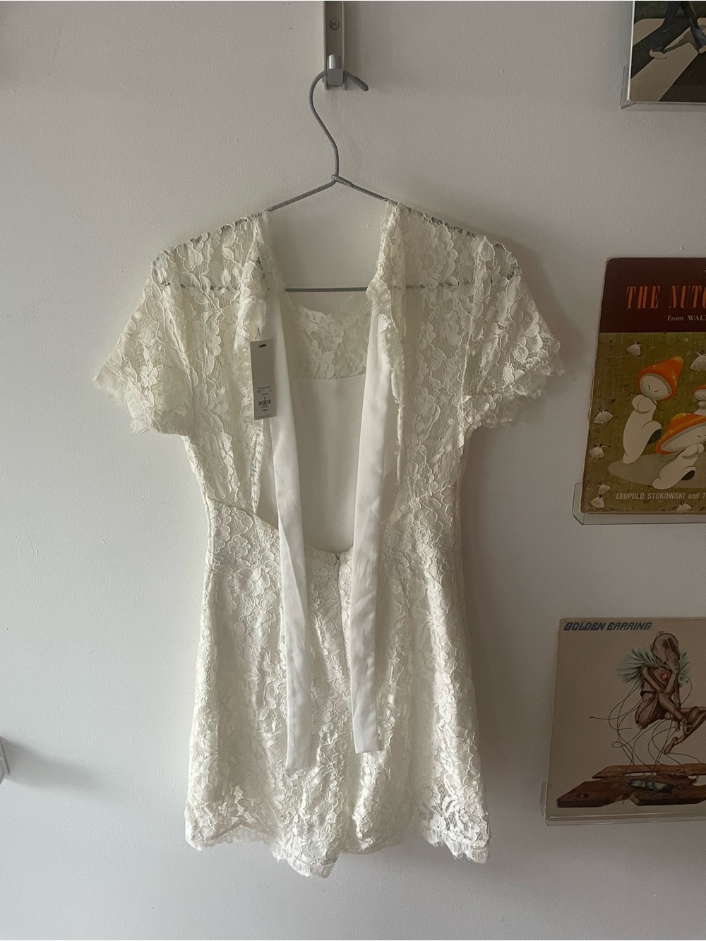 Francesca's Ivory Lace Romper with Tie Neck